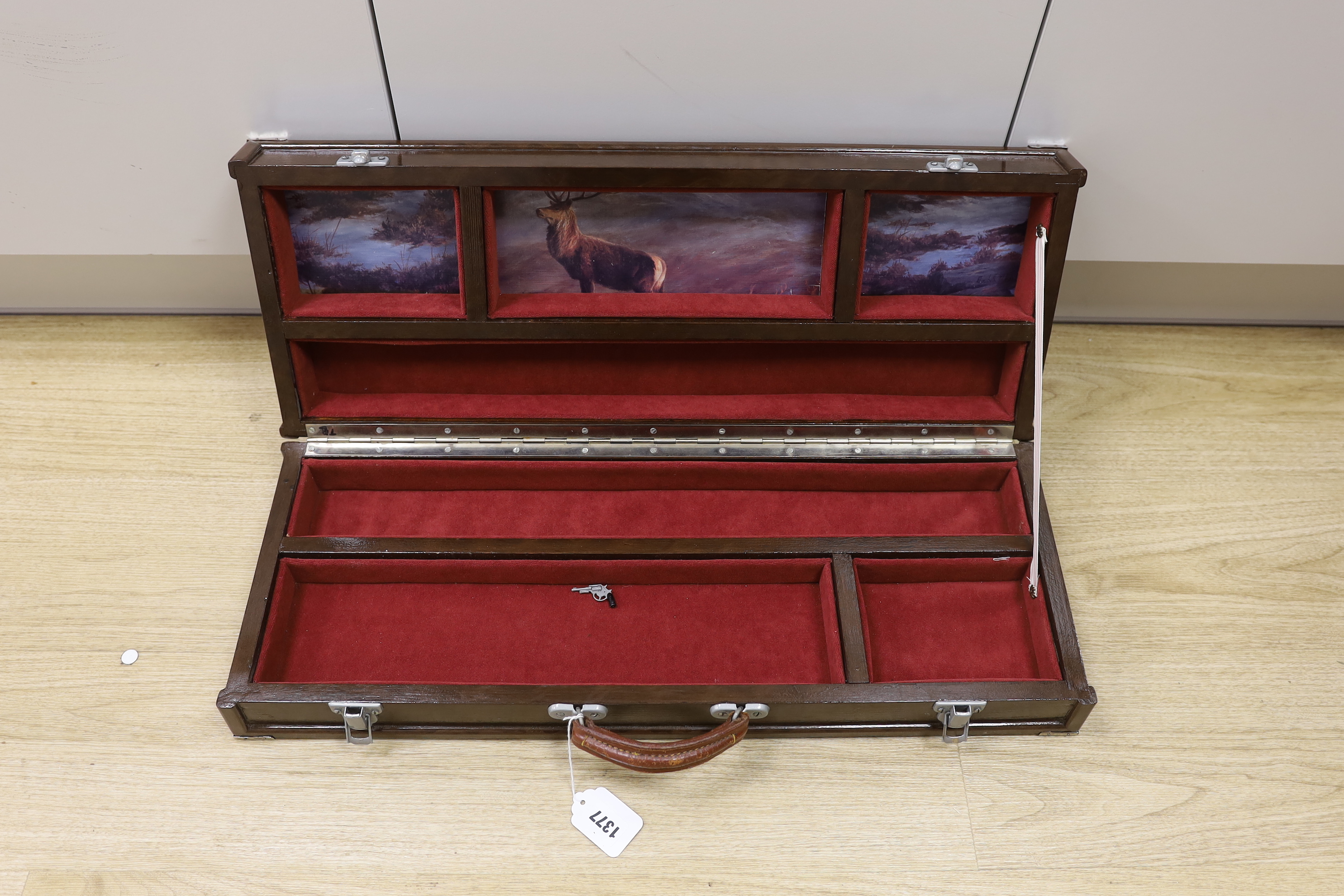 A gun box, 67cm long, 15.5cm deep